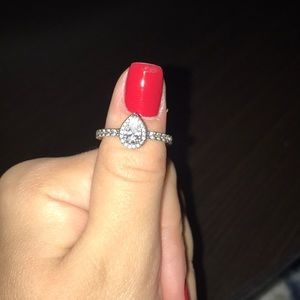 A radiant teardrop pandora ring. Color clear.